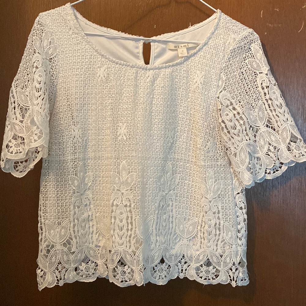 White blouse with lace. Lightly worn without tags.